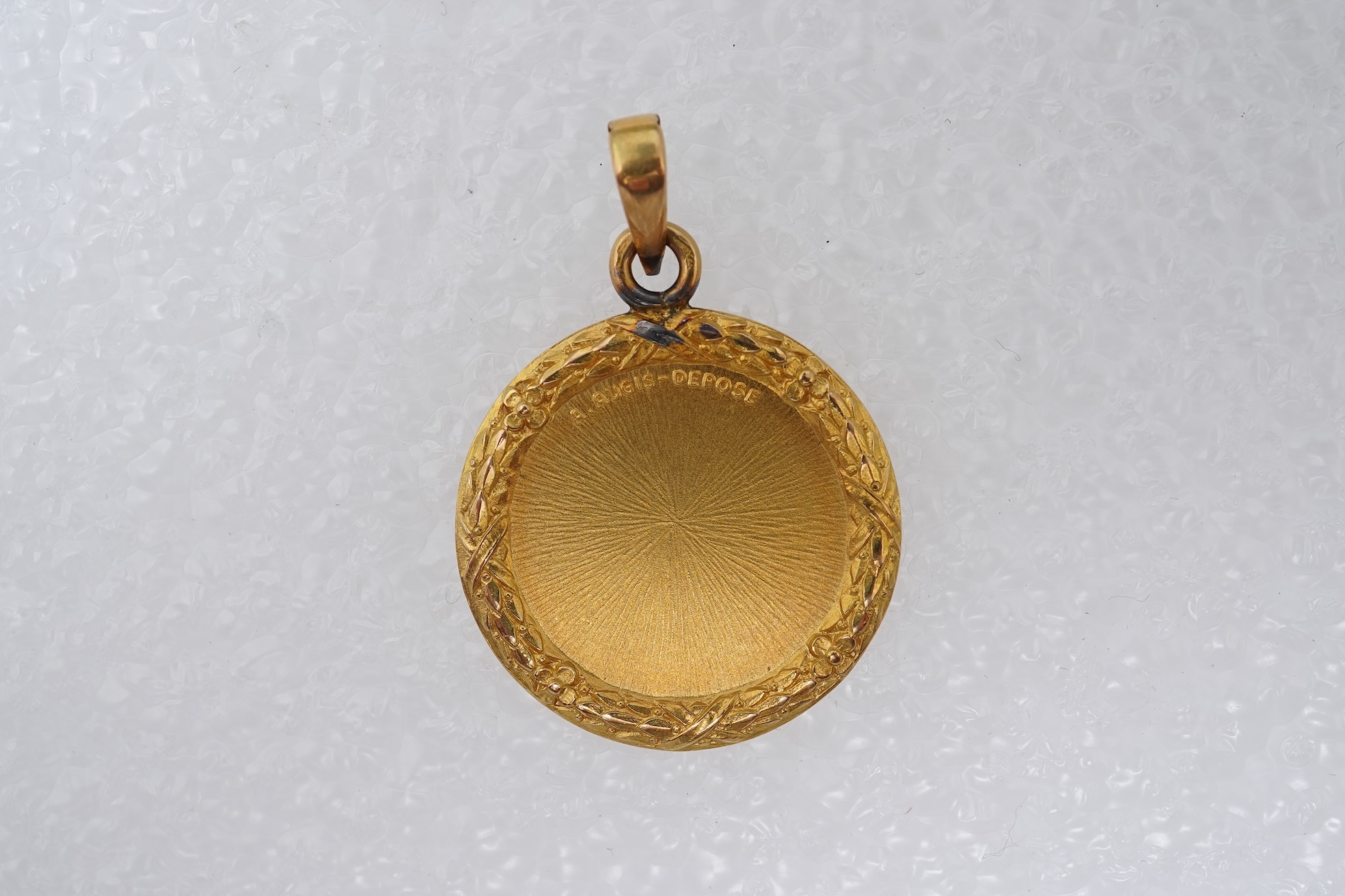 Alphonse Auguis, a medallion pendant, France, early 20th century
